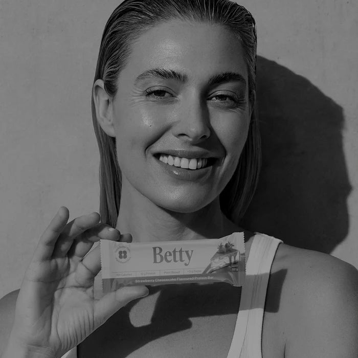 Image showing a woman holding a Betty Bar with her hands