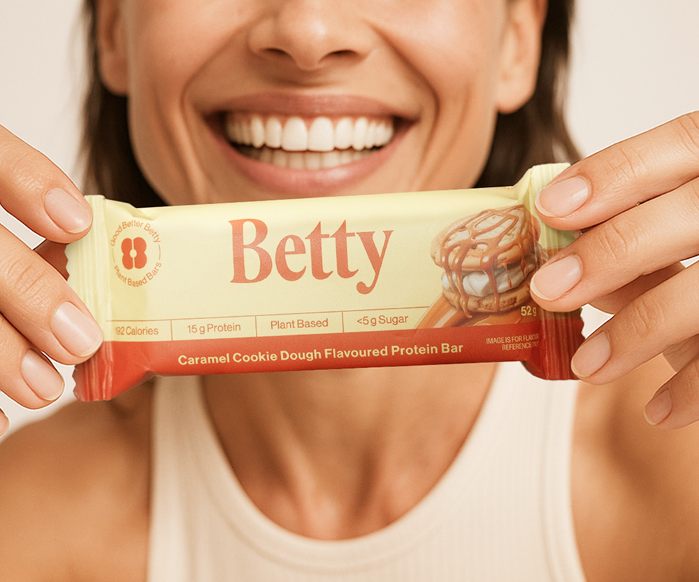 Image showing a woman holding a Betty Bar with her hands